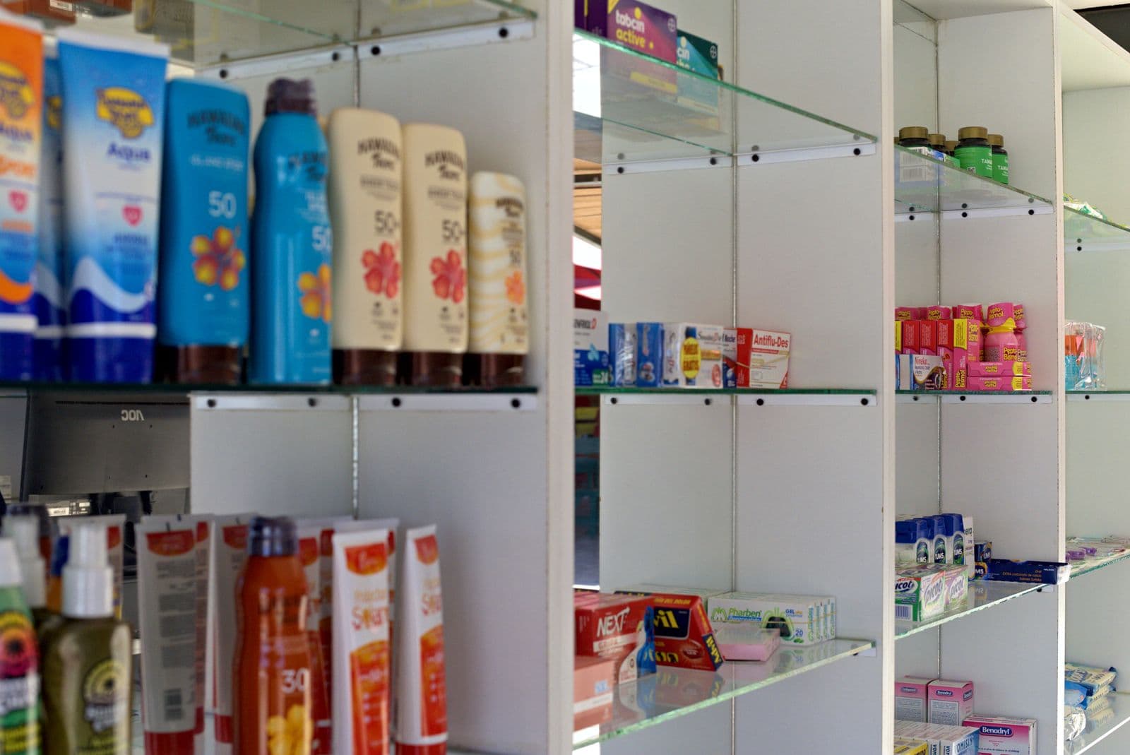 Sun care and everyday products on the shelves at Ocean Pharmacy